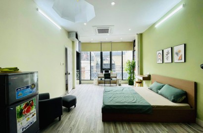 Wooden floor serviced apartment with balcony in Phu Nhuan District