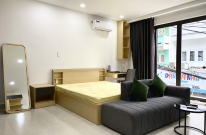 New serviced apartmemt for rent with big window on Nguyen Cuu Van street