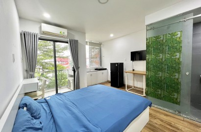 Wooden floor serviced apartment for rent on Le Van Huan street