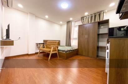 Wooden floor serviced apartment for rent on Cach Mang Thang 8 in Tan Binh District