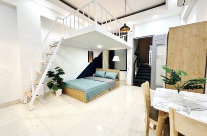 Duplex apartment for rent with balcony in Binh Thanh District on Nguyen Gia Tri Street