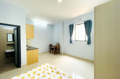 Spacious apartmemt with window on Xom Chieu street in District 4