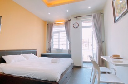 Serviced apartmemt for rent with balcony, washing machine on Xo Viet Nghe Tinh street