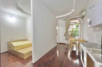 Wooden floor 1 Bedroom apartment for rent with balcony on Dang Van Ngu Street