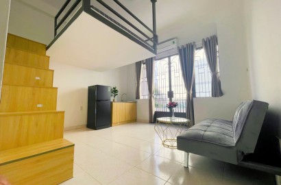 Duplex apartment for rent with balcony on Pham Ngu Lao street in District 1