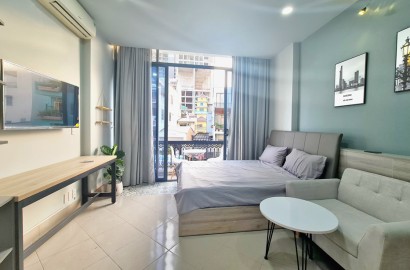 Serviced apartmemt for rent with balcony on De Tham street in District 1