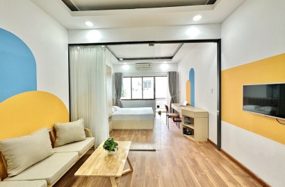 Bright 1 Bedroom apartment for rent with balcony on Cach Mang Thang 8 street, near Ben Thanh Market