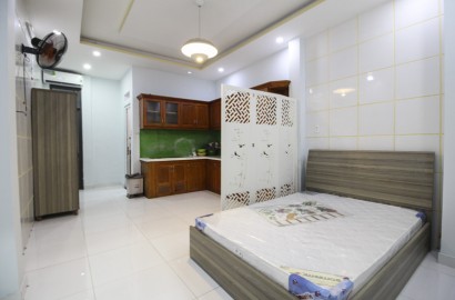 Ground floor studio apartment for rent on Nguyen Van Dau Street