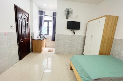 Studio apartment with open windows on Nguyen Thien Thuat street