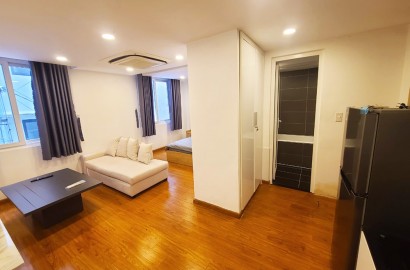 Studio apartment for rent with wooden floor on Truong Sa street