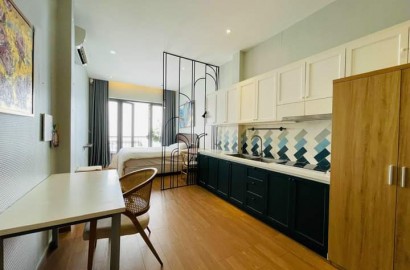 Cozy wooden floor serviced apartment on Nam Ky Khoi Nghia street