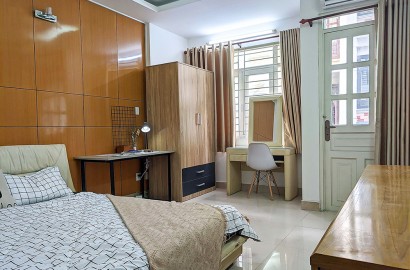 Clean studio apartment for rent, small balcony on Nguyen Huu Canh street