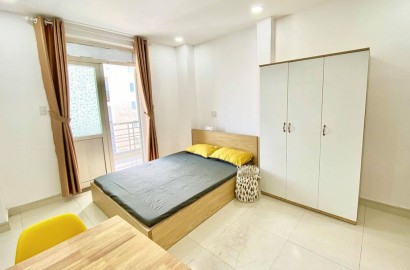 Fully furnished studio for rent with balcony near Gia Dinh park
