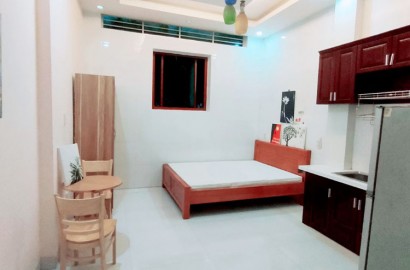 Mini apartment with open windows on Nguyen Huu Canh street