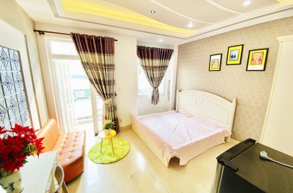 Airy serviced apartment for rent with balcony in Phu Nhuan District