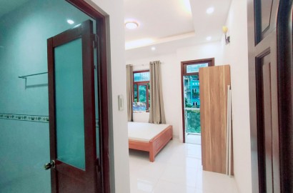Mini apartment with small balcony on Nguyen Huu Canh street