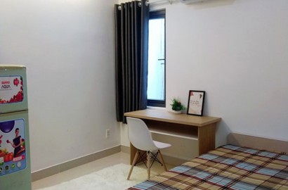 Serviced apartment with open window on Nguyen Huu Canh street