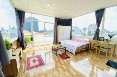 Serviced apartment with balcony with open view is located on Ngo Tat To street