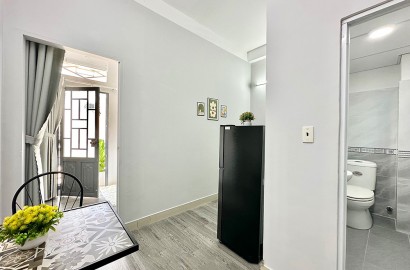 Cho thuê căn hộ mini 1 phòng ngủ ban công, đầy đủ nội thất gần chợ Tân Định