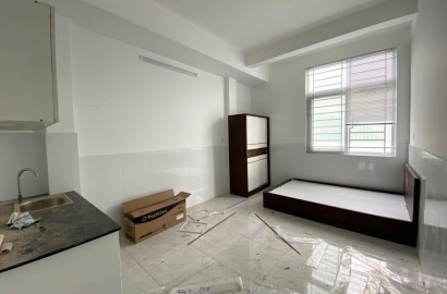 New serviced apartment with bright windows on No Trang Long street