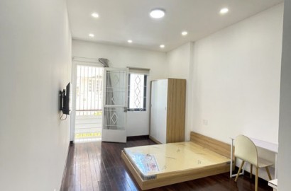 Apartment for rent with wooden floor, balcony on Cong Hoa street