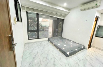 Serviced apartment with glass windows with lots of light on No Trang Long street