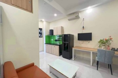 New serviced apartment, wooden floor on Hoang Hoa Tham street