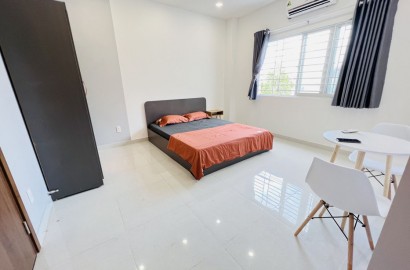 Studio apartment with large windows near Tan Binh market