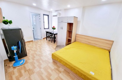 Studio apartment with open windows on Nguyen Trai street