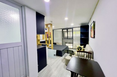 Mezzanine studio apartment for rent near Tan Dinh market
