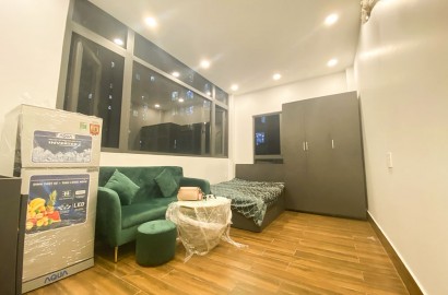 Serviced apartment for rent with big window near Viettel Tower in district 10