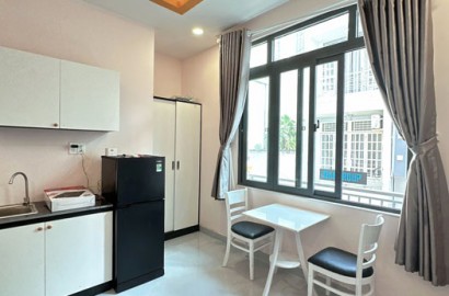 Studio apartment with large windows on Nguyen Huu Canh street