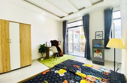 Studio apartmemt for rent with balcony on Lam Van Ben street in District 7