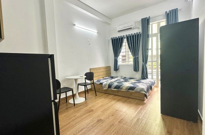 Studio apartmemt for rent with balcony on Nguyen Duy street near Ba Chieu market