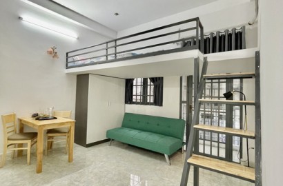 Duplex apartment for rent with balcony on No Trang Long Street