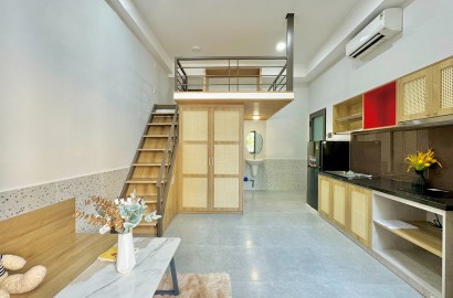 Balcony Duplex apartment for rent on Nguyen Van Mai Street