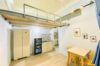 Attic studio apartment for rent on Nguyen Minh Hoang Street