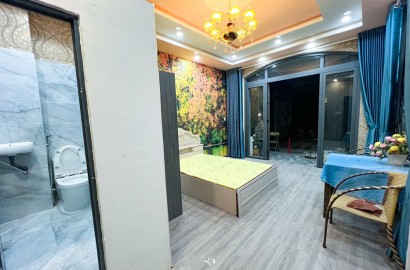 Ground floor studio apartment for rent with window on Huynh Van Banh Street