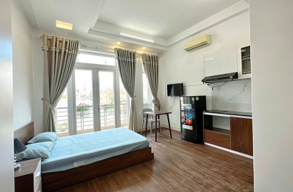 Serviced apartmemt for rent with balcony, washer on Dinh Cong Trang Street