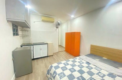 Studio apartment for rent with balcony on Nguyen Huu Cau Street