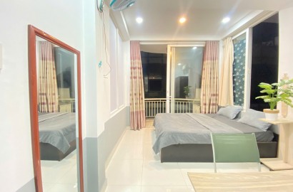 Studio balcony for rent on Nguyen Huu Cau Street